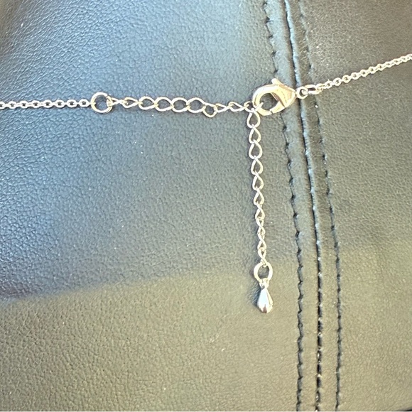 Beautiful Silver Tone Delicate Cross Pendant Necklace with 3 CZ Accents - Picture 8 of 10